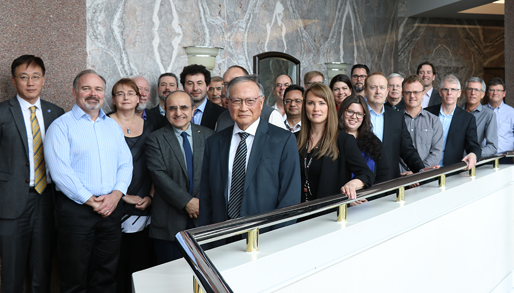 Group of supplier participants gather for photo